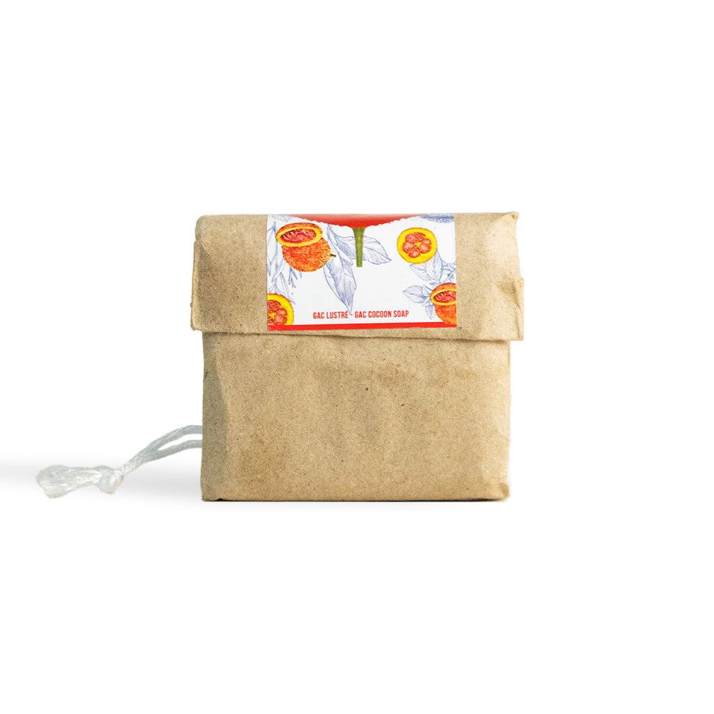 Natural beauty soap made with Gac fruit oil and silk cocoons to stimulate collagen and smooth skin texture.
